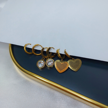 Trio de brincos coração, ponto de luz e argola inox - Dourado