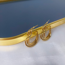 Argola Coração Trançado Inox