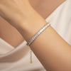 Pulseira Riviera baguete dourada com extensor aço inoxidável