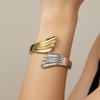 Bracelete asas dois banho prata e dourado semijoia