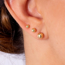 Trio de brincos esferas aço inox - Dourado