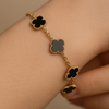 Pulseira Trevo Preto Dourado Aço Inox Antialérgica