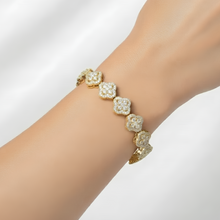 Pulseira trevo cravejado dourada folheado a ouro