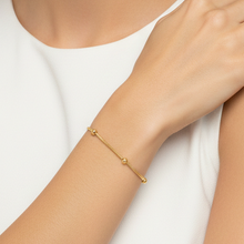 Pulseira com mini bolinhas dourado - aço inoxidável