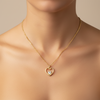 colar com coração vasado e coração cristal dourado semijoia
