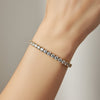 pulseira cravejada com zircônias quadradas dourada folheado a ouro